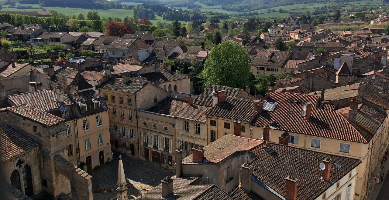 Aerial view of rooftops and countryside in Cluny, Burgundy.