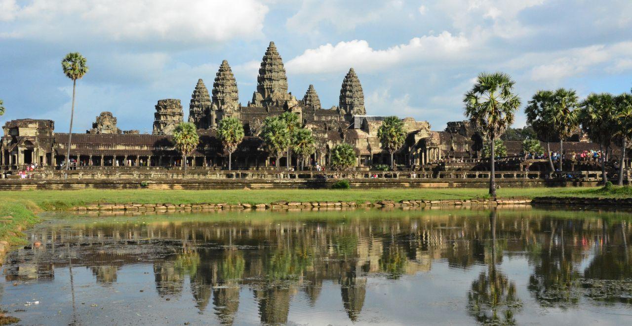 Angkor Wat temple complex reflecting in a pond