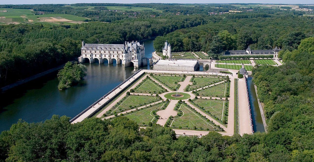 Aerial view of Château de Chenonceau with its formal gardens.