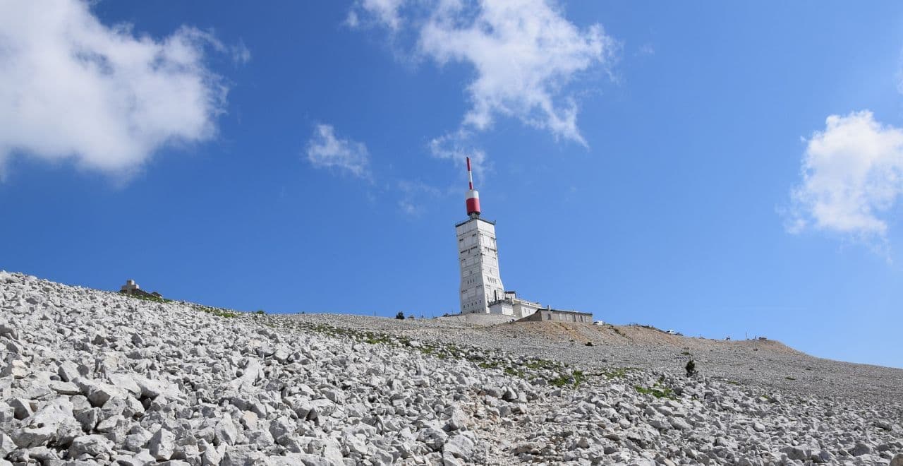 Summit of Mont Ventoux with its distinctive red and white tower.