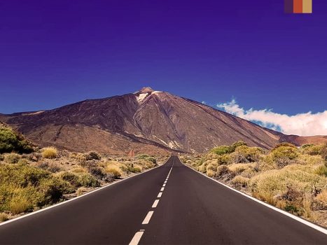 tarmac road leading up to mount teide in tenerife