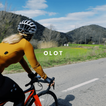 Lady cycling from Girona to Olot in Catalonia