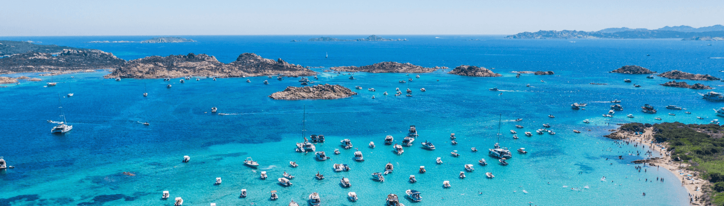 View of boats on the Sardinia coastline