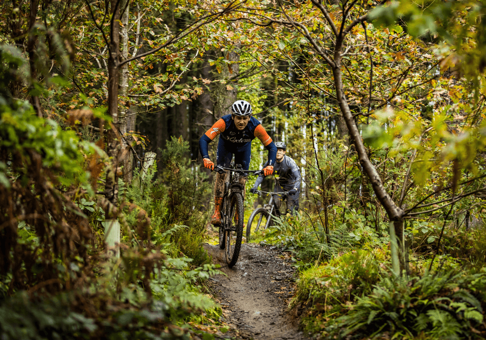 cyclist riding in the isle of man forest